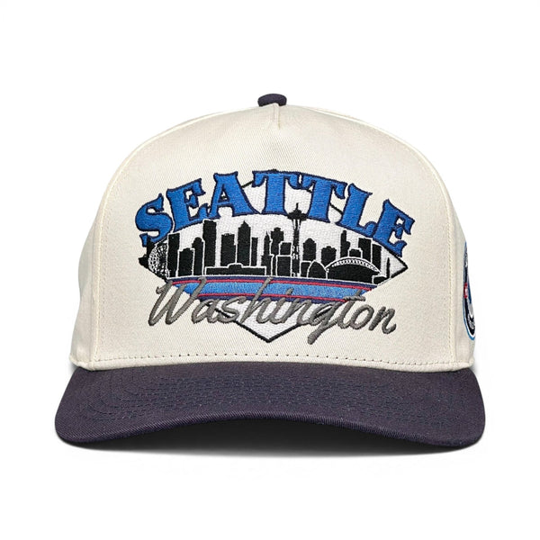 Seattle Snapback - The Kraken features a retro two-tone design with SEATTLE over the skyline, celebrating the Seattle Kraken hockey team.