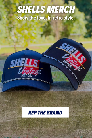 Two Shells Vintage Hat Co. rope hats leaning against each other with overlay text "Shells Merch" promoting the collection.