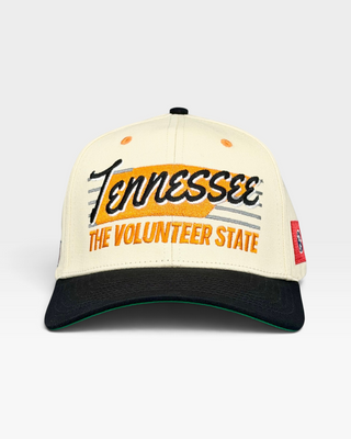 Tennessee Snapback - The Neyland (Cream/Black): A retro-style cap featuring TENNESSEE and THE VOLUNTEER STATE on the crown, celebrating the vibrant Neyland Stadium atmosphere.