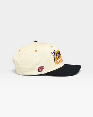 Tennessee Snapback - The Neyland (Cream/Black) hat features retro cream crown, orange eyelets, black visor, and embroidered SV patch, celebrating Neyland Stadium's lively atmosphere.