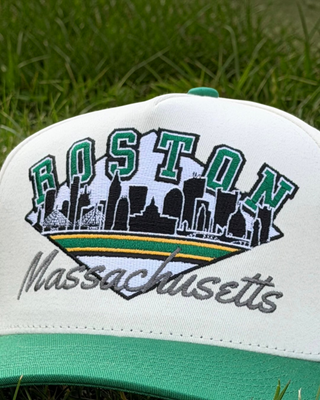 Retro Boston Snapback - The Bird cap with stylized skyline embroidery, celebrating Boston and the Celtics in a vintage, throwback style.