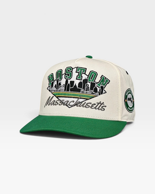 Retro Boston Snapback - The Bird cap featuring a cream crown, green brim, embroidered BOSTON and skyline, nodding to Celtics pride with vintage flair.