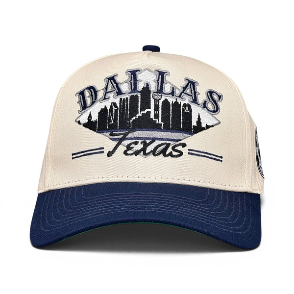Dallas Snapback - The Aikman features a retro two-tone design with a Dallas skyline and Texas embroidery, celebrating vintage football heritage and iconic Cowboys era.