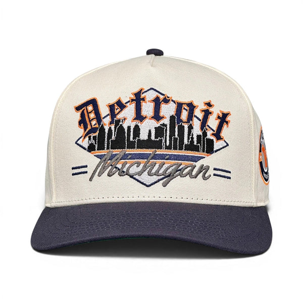 Detroit Snapback - The Miggy: A retro baseball cap featuring an embroidered Detroit skyline and Detroit vs. Everybody, inspired by the Tigers and vintage sports style.