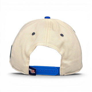 Rear view of Kentucky Snapback - The Rupp (Cream/Blue) cap, featuring a blue button, adjustable snap strap, and Shells Vintage Hat Co. label.