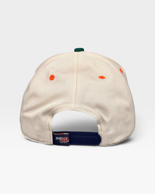 Retro Miami Snapback - The U, featuring a cream cotton twill with orange eyelets, green button, navy snap-closure, and Shells Vintage Hat Co. label, representing Miami Hurricanes football.