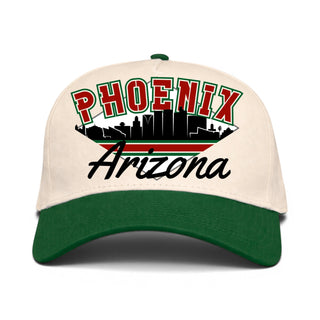 Phoenix Snapback - The Doan (Cream/Green) cap with retro Phoenix skyline and Arizona script, embodying the unexpected success of desert hockey.