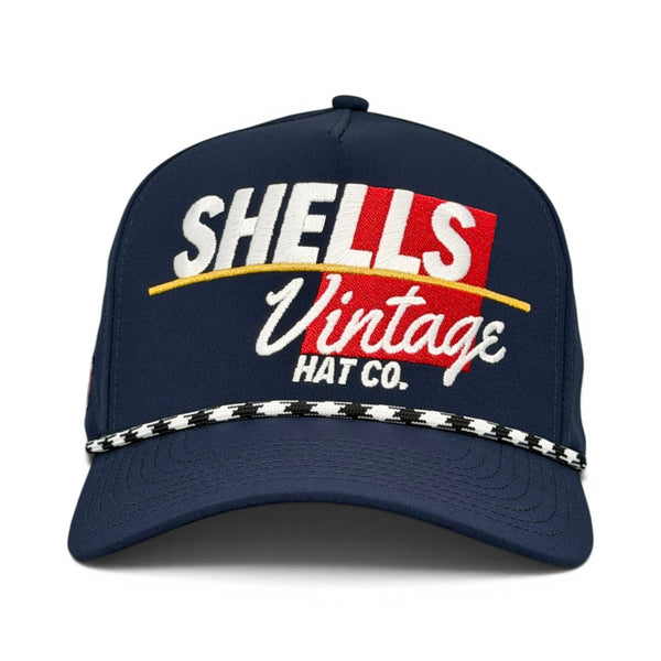 Shells Vintage Snapback - The Shell (Navy): Retro navy trucker cap with SHEDS Vintage Hat Co. embroidered on the front, featuring a braided rope and snapback closure.