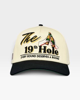 Retro The 19th Hole snapback with a golf-bar theme, featuring embroidered beer bottles and slogan Every round deserves a round. Perfect for casual, fun-loving golfers.
